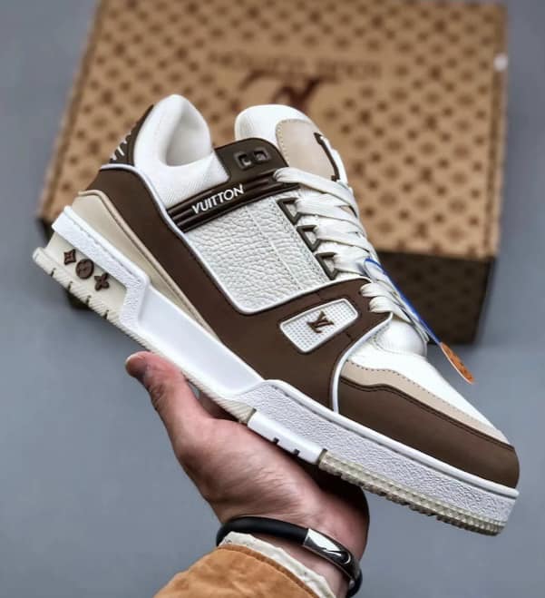 499243729_122129295866773908_3334759939746195305_n LV Trainer Sneaker Moka - Image 1