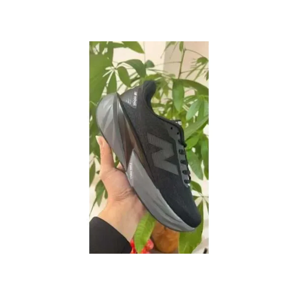 p37801-main New Balance FuelCell Rebel v5 Black - Image 1